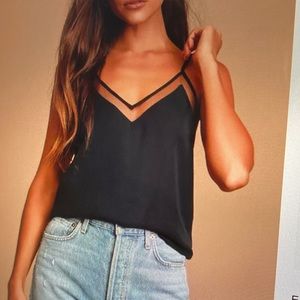 Lightly worn black lulu’s tank with mesh detail